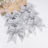 imageOAOLEER 6PCS Glitter Cheer Hair Bows for Cheerleading Shiny Rhinestones Large Jumbo Cheer Bow with Ponytail Holder for Teen Girls Cheerleader BlackSilver