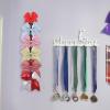 imageOAOLEER Cheer Bow Holder for Cheerleading Backpack Bag Sports Cheerleading Bow Storage Hanging Chain 5 Clasp Red 1 CountRed 10 Clasp