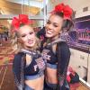 imageOaoleer 12PCS Glitter Cheer Hair Bows for Cheerleading 7inch Large Jumbo Cheer Bow with Ponytail Holder for Teen Girls Softball Cheerleader BlueRed